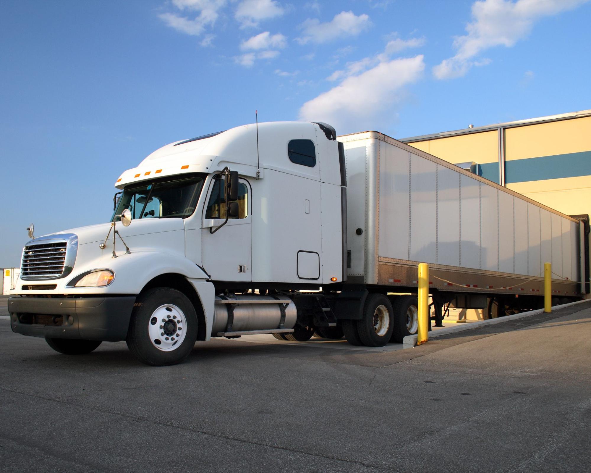 A semi truck in a loading dock