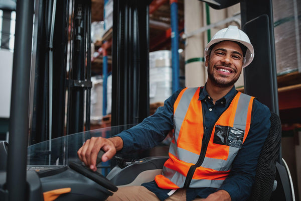 Man driving a forklift in an ergonomic seat