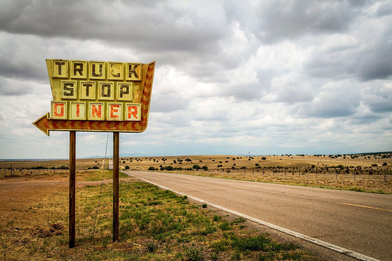 Road sign indicating a truck stop where drivers are expected to follow truck stop etiquette