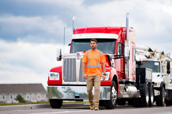 Truck driver shows concept of logistics. truck driver