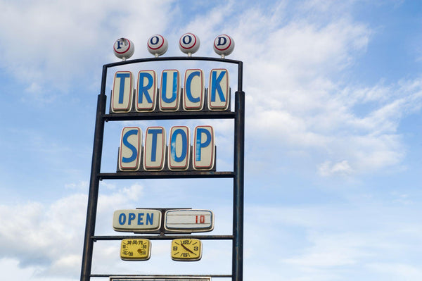 truck stop sign on a highway