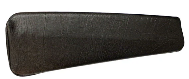 Textured black armrest from a vintage car, featuring a rectangular shape with rounded edges and visible wear patterns