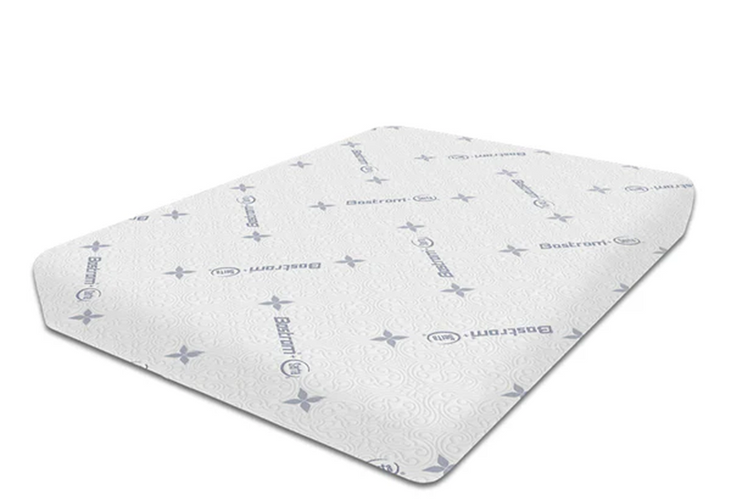 A white mattress with a patterned cover